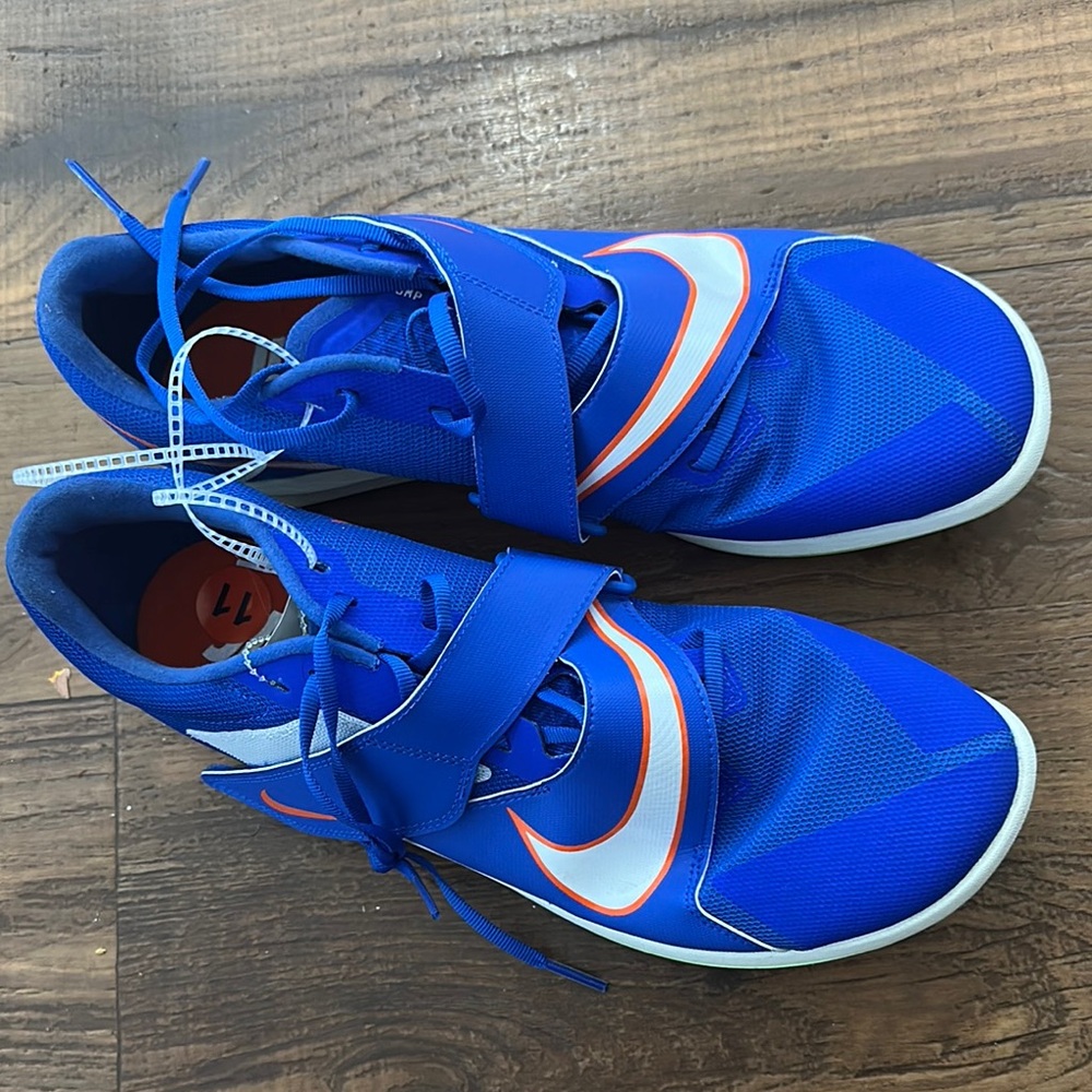Kids Blue Nike Shoes with Orange Accents